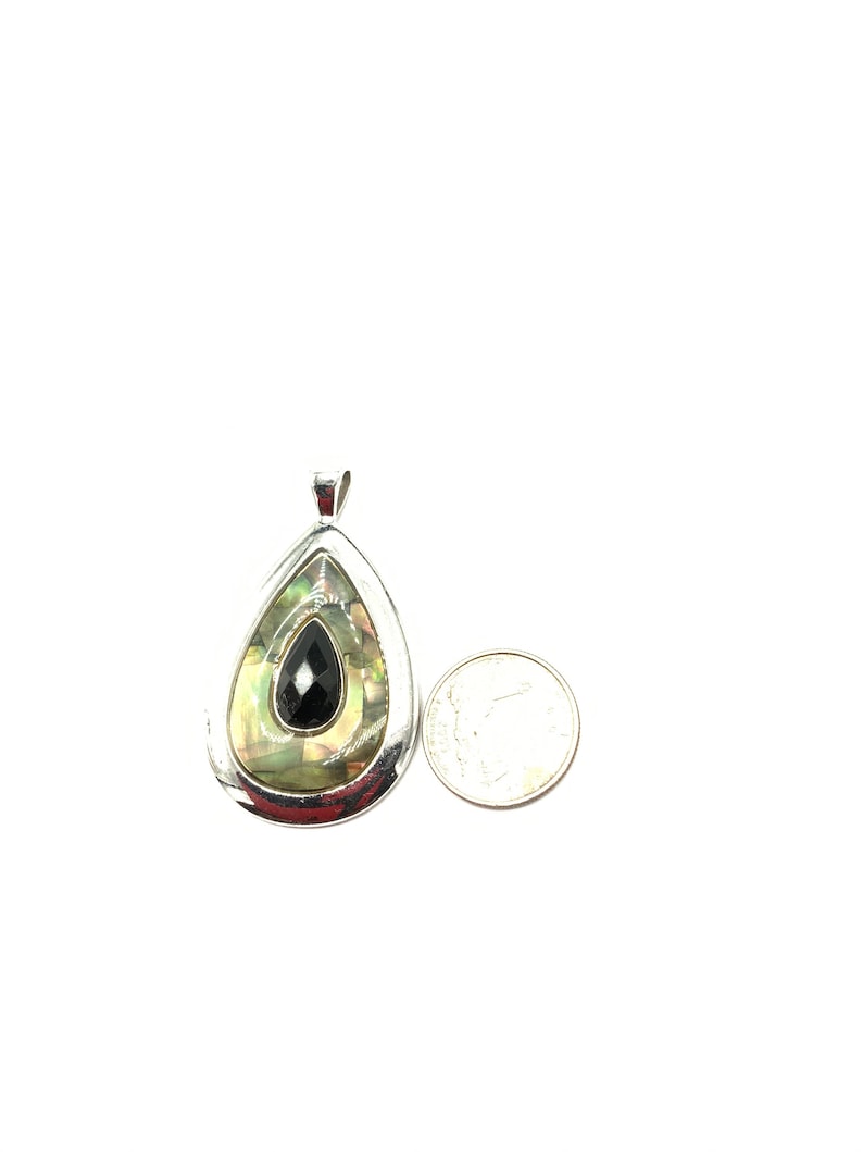 Gorgeous collectible teardrop pendant with abalone and black crystal by Lia Sophia and silver tone.