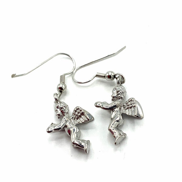 Gorgeous collectible Angel silver tone,hoop earrings by Cookie Lee.