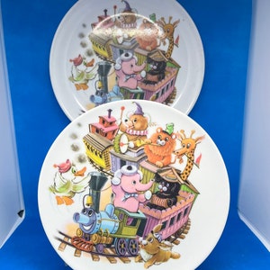Lot of 2 Vintage Graduating Melmac Rainboware Children’s Plates Train & Animal Themed