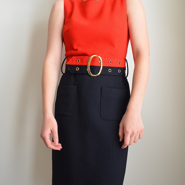 vintage 80s red and black sheath dress with matching belt from an original milly of New York