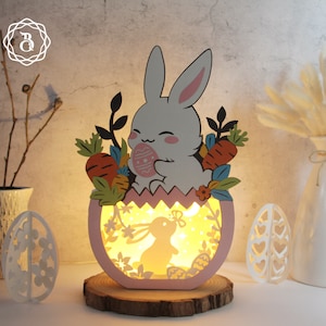 Lapin de Pâques mignon tenant une boîte d'ombre d'oeufs - oeufs de Pâques 3D SVG fichiers - oeufs de Pâques papier découpé modèle