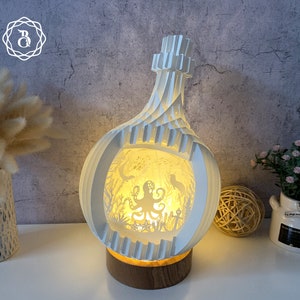 Pulpo 3D emergente en una botella SVG, archivo de plantilla de corte de papel de pulpo, tarjeta 3D emergente bajo el mar