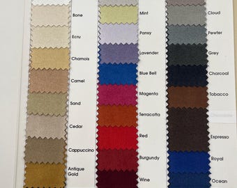 May include: Color swatch card featuring a variety of fabric samples in a range of colors. The swatches are arranged in columns, with each swatch labeled with a color name. Colors include Snow, Silver, Thunder, and Black.