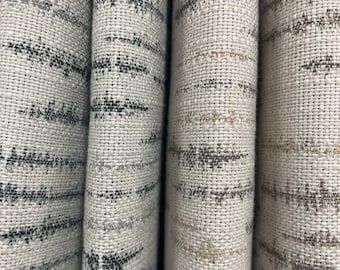 May include: Four fabric swatches with a white background and a subtle gray and brown striped pattern.
