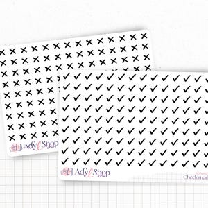 Könnte beinhalten: Zwei Stickerbögen mit schwarzen Häkchen und X-Markierungen auf weißem Hintergrund. Die Aufkleber dienen der Planung und Organisation. Der Text "Ady Shop" und "Check mark" sind sichtbar.