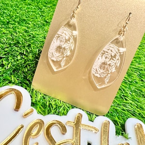 Pendientes de tigre de acrílico transparente: Joyas para el día del juego