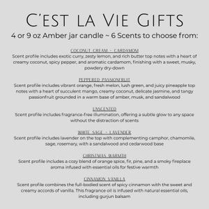 May include: A light gray informational graphic for C'est La Vie Gifts listing 4 or 9 oz amber jar candles with six scent options: Coconut Cream Cardamom, Peppered Passionfruit, Unscented, White Sage Lavender, Christmas Warmth, and Cinnamon Vanilla.