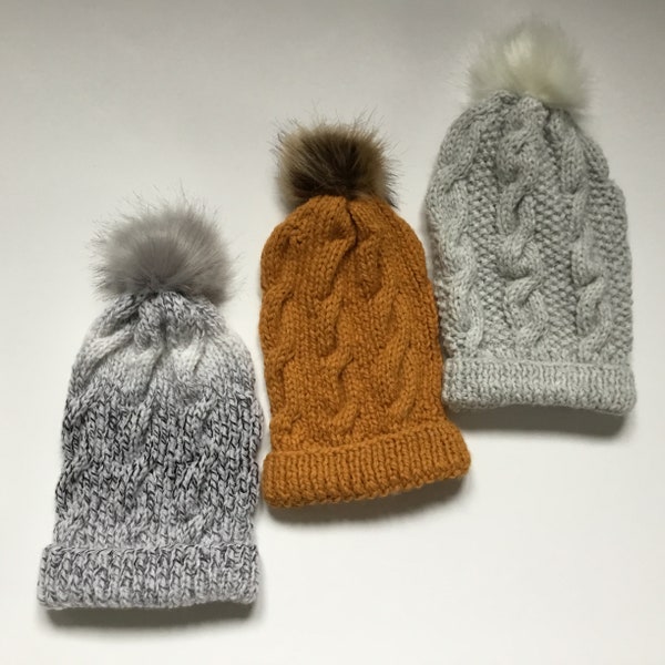 Bonnet torsadé en laine et pompon