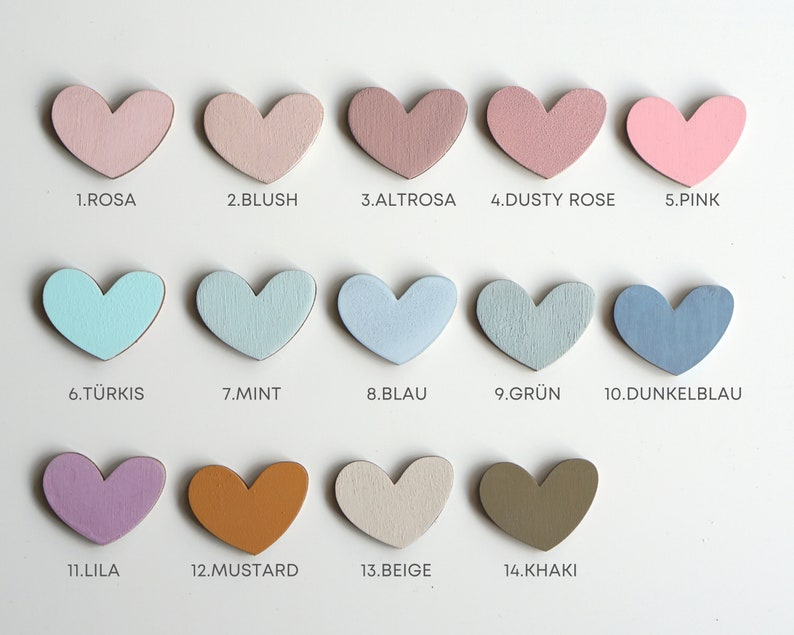 May include: A chart of 14 different paint colors displayed as heart shapes. The colors are: rosa, blush, altrosa, dusty rose, pink, t&uuml;rkis, mint, blau, gr&uuml;n, dunkelblau, lila, mustard, beige, and khaki.