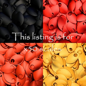 May include: A close-up image of 50 black, red, and gold metal scales. The scales are arranged in a random pattern and are all the same size and shape. The text "This listing is for x50 scales" is visible in the image.