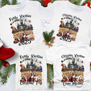 May include: Four white t-shirts with a Christmas vacation theme featuring a graphic of the Universal Studios Hogwarts castle with the text "Family Vacation" and "Christmas Vacation" on each shirt. The shirts also include the text "Universal Studios" and "2025".