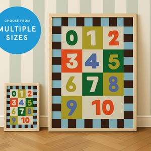 May include: Two framed number prints. The larger print displays numbers 0-10 in a grid of colorful squares. The smaller print mirrors the design. The text "CHOOSE FROM MULTIPLE SIZES" is in a blue circle in the upper left.