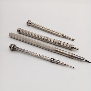 Silver 1903 Propelling Pencil agate top by Percy Whitehouse plus silver plated pen / 2 x pencil holders