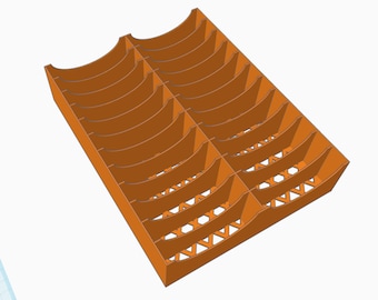 May include: An orange plastic organizer with 12 curved compartments. The organizer is designed to hold small items, such as craft supplies or jewelry.