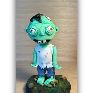 Halloween zombie calendar topper and figurine