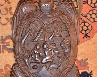 carved wood turtle wall hang