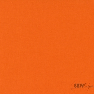 May include: A solid orange fabric with a textured surface. The fabric is a vibrant shade of orange, and the texture is visible throughout the material. The words "SEWendipitous" are in the bottom right corner.