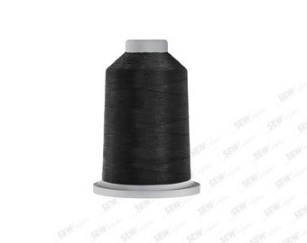 May include: A large spool of black sewing thread featuring a cylindrical shape with a flat base and a smaller top cap. The thread is tightly wound around the central core, creating a smooth, uniform texture throughout the entire surface.