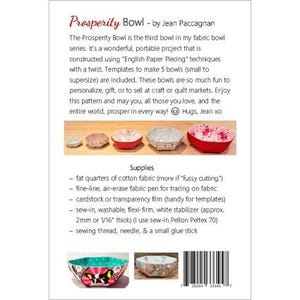 May include: The back of a sewing pattern titled "Prosperity Bowl" by Jean Paccagnan. The pattern includes instructions for making fabric bowls using English Paper Piecing techniques. The image shows several finished bowls in various colors and patterns.