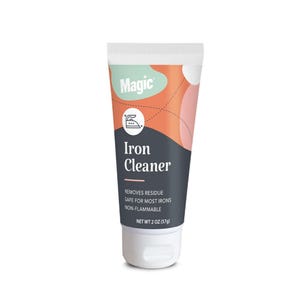 May include: A squeeze tube of Magic Iron Cleaner with a white cap. The label features a peach and dark gray color scheme with an iron icon. Text reads: Magic, Iron Cleaner, Removes residue, Safe for most irons, Non-flammable, Net wt 2 oz (57g).