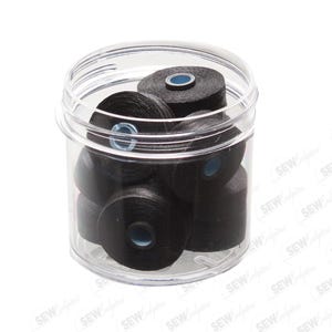 May include: A clear plastic container filled with several spools of black thread. Each spool has a blue center. The container is transparent, allowing visibility of the thread spools. The image is set against a white background.