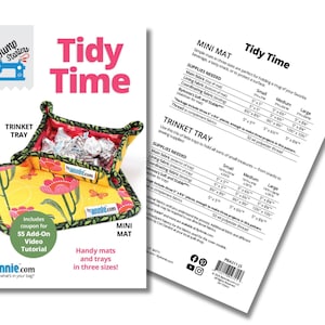 May include: A sewing pattern for a mini mat and trinket tray. The pattern cover features a yellow floral print tray with a red interior, filled with candies. The text "Tidy Time" is in pink.