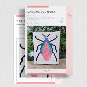 May include: A quilting pattern for a bug quilt. The pattern includes a black and white grid with a colorful bug design in the center. The text "DARLING BUG QUILT" is at the top of the page. The text "Our boy design" is in the center of the page.