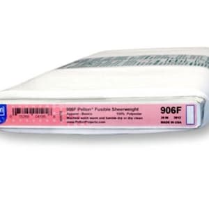 May include: A roll of white Pellon 906F fusible sheerweight fabric. The label indicates it is 100% polyester and 30 yards in length. The label is pink and blue with black text. The fabric is used for apparel basics.