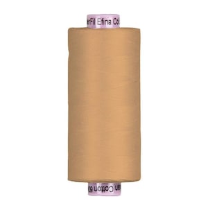 May include: A spool of tan-colored thread with the text "Efilna Col" and "an Cotton 60" printed on the ends. The thread is tightly wound around a cylindrical core, suitable for sewing and crafting projects.