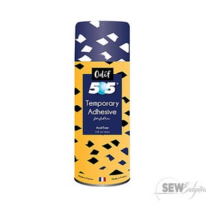 May include: A can of Odif 505 Temporary Adhesive for fabric. The top is navy blue with white geometric shapes. The body is yellow with black shapes and the product name and details in white and blue.