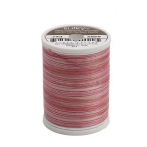 May include: A spool of Sulky 40 wt. cotton thread in a pink and white variegated color. The spool is labeled "Sulky" and has the number "4029" printed on it.