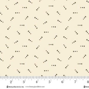 May include: Cream-colored fabric with a repeating pattern of small, scattered geometric shapes. The pattern includes sets of three small shapes, with two squares and a diamond, in shades of brown and black. The fabric is measured in inches.
