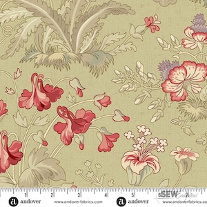 May include: Fabric with a floral pattern featuring red and pink flowers, gray leaves, and a large gray and beige plant on a light green background. The fabric has a textured appearance and a ruler is at the bottom.