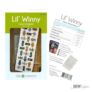 May include: A table runner pattern titled "Lil' Winny" with dimensions of 16.5" x 48". The pattern includes fabric requirements and is designed by Gudrun Erla. The pattern is from GE Designs.
