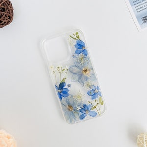 Coque pour iPhone 16 Pro Max 16e 15 Pro Max, grandes fleurs bleues et petites fleurs blanches, coque Google Pixel 9A Pro 8A 7 Pro 6 Pro
