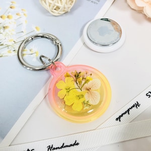 Natural yellow white flower AirTag holder,AirTag case,colorful AirTag keychain,gift for her,cute waterproof AirTag case,pet tracker case