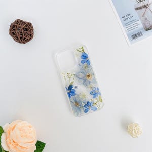 Big blue flowers small white flower pressed flower phone case for iPhone 17e 16e 15 Pro Max,Google Pixel 10 Pro 9A 8 Pro 7 Pro case