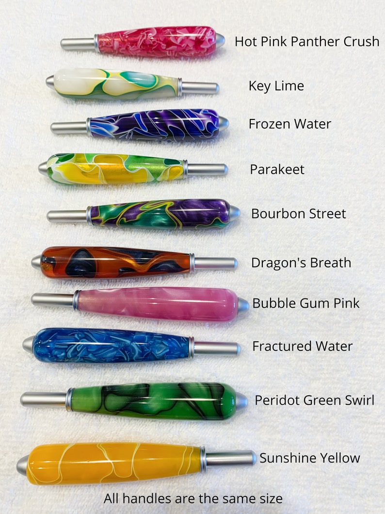 May include: Ten cylindrical handles with silver metal ends, each featuring unique marbled or solid resin patterns. The colors include pink, lime, blue, yellow, green, purple, orange, and red. Text labels identify each color pattern.