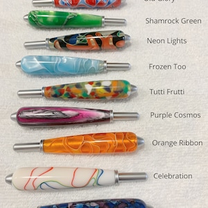 May include: Nine cylindrical handles with metallic tips, each featuring unique resin patterns labeled as Old Glory, Shamrock Green, Neon Lights, Frozen Too, Tutti Frutti, Purple Cosmos, Orange Ribbon, Celebration, and Maleficient. Text states: All handles are the same size.