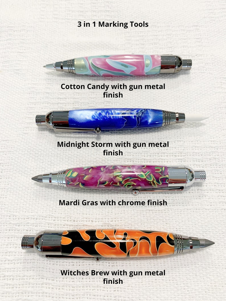 May include: Four 3 in 1 marking tools. The first is Cotton Candy with gun metal finish. The second is Midnight Storm with gun metal finish. The third is Mardi Gras with chrome finish. The fourth is Witches Brew with gun metal finish. Each tool features a patterned barrel and metallic hardware.