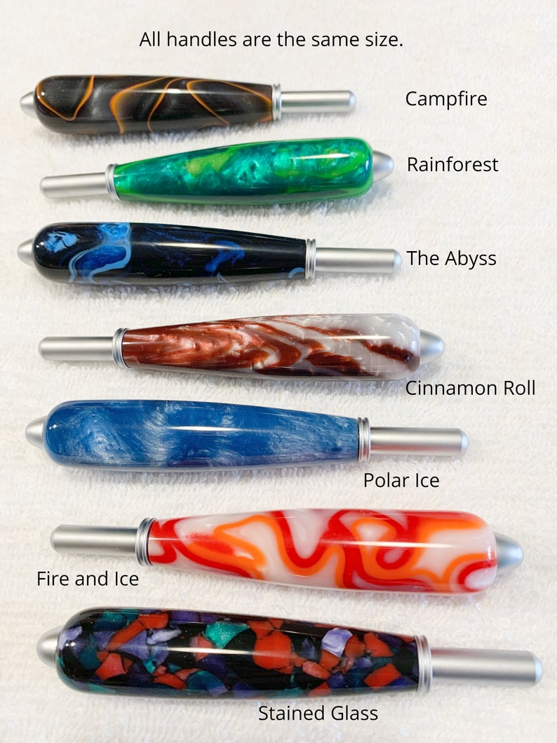 May include: Seven resin handles with silver-toned metal tips, each featuring unique color patterns labeled as Campfire, Rainforest, The Abyss, Cinnamon Roll, Polar Ice, Fire and Ice, and Stained Glass. Text states: All handles are the same size.