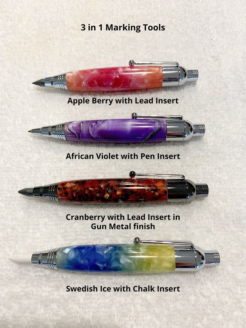 May include: Four 3 in 1 Marking Tools with chrome or gun metal hardware. The first is Apple Berry with a lead insert, the second is African Violet with a pen insert, the third is Cranberry with a lead insert, and the fourth is Swedish Ice with a chalk insert.
