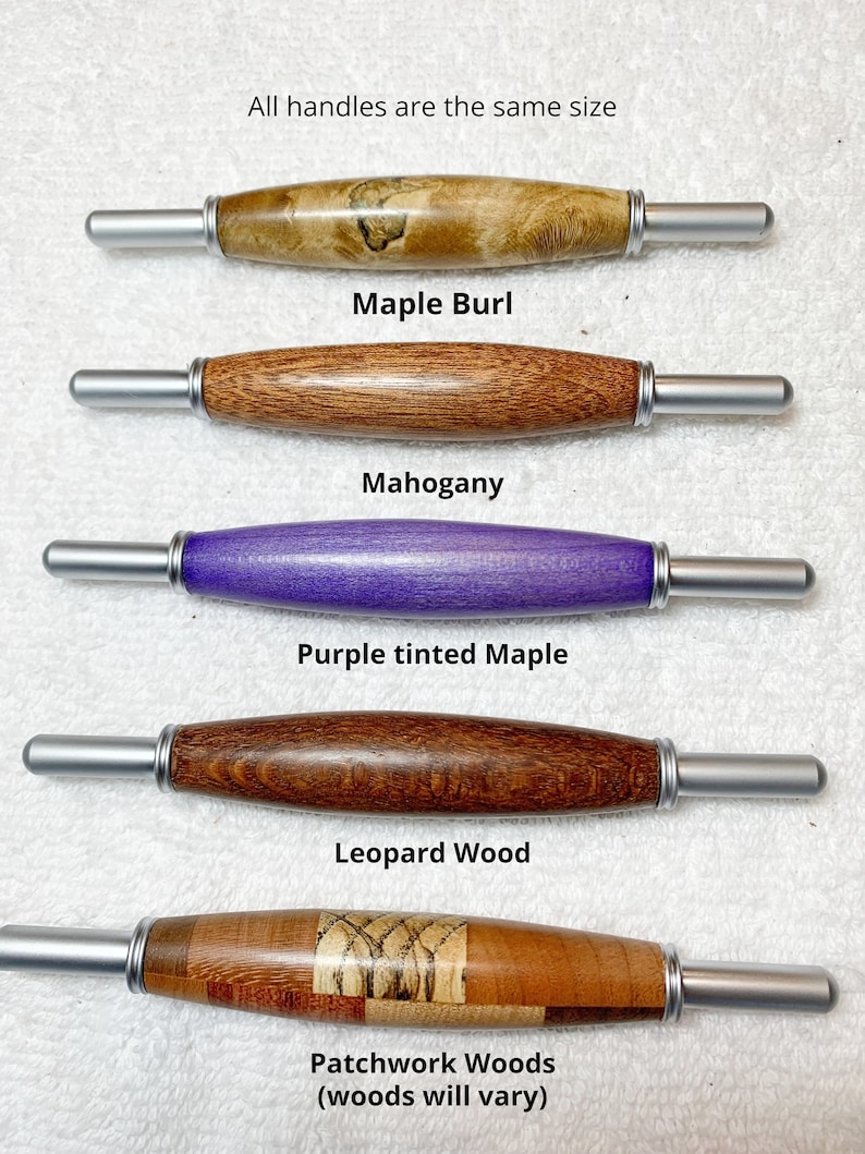 May include: Five different wooden pen handles with silver metal ends. The handles are made of maple burl, mahogany, purple tinted maple, leopard wood, and patchwork woods. All handles are the same size. "All handles are the same size" is written at the top of the image.