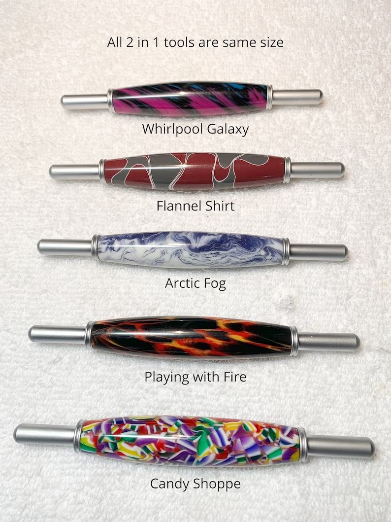 May include: Five 2-in-1 tools with silver metal ends and patterned acrylic barrels. The patterns are labeled Whirlpool Galaxy, Flannel Shirt, Arctic Fog, Playing with Fire, and Candy Shoppe. Text states: All 2 in 1 tools are same size.