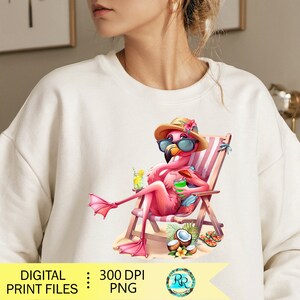 May include: Cream-colored sweatshirt featuring a cartoon flamingo relaxing in a beach chair, wearing sunglasses and a hat. The flamingo holds a drink, with coconuts and flip-flops nearby. The text "DIGITAL PRINT FILES : PNG" is at the bottom.