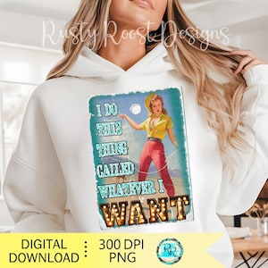 K&ouml;nnte beinhalten: Wei&szlig;er Kapuzenpullover mit einer Grafik, die eine Illustration im Vintage-Stil einer Frau in einem gelben Hemd und roter Hose zeigt, die ein Seil h&auml;lt. Der Text auf der Grafik lautet "I DO THIS THING CALLED WHATEVER I WANT."