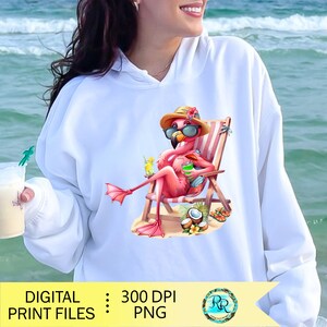 May include: White hoodie featuring a cartoon flamingo in sunglasses, a hat, and a beach chair, holding a drink. The flamingo is on a beach with coconuts and flip-flops. The text "DIGITAL PRINT FILES" is at the bottom.