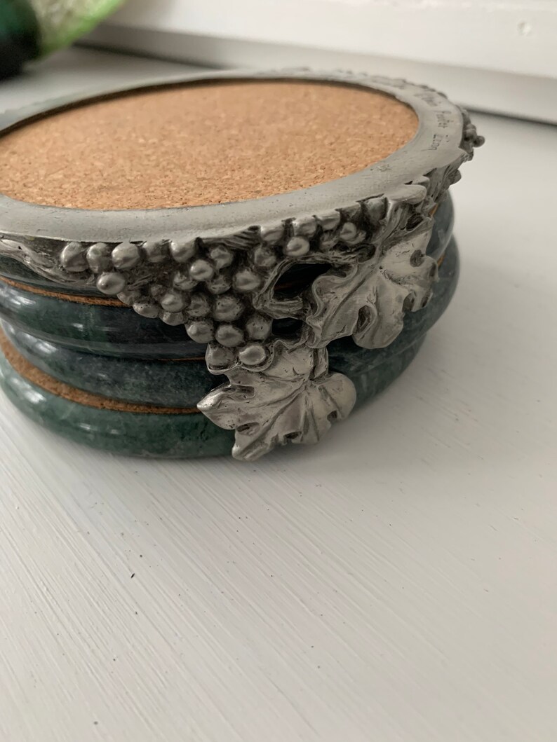 Vintage Seagull Pewter and marble grape pattern coaster set.
