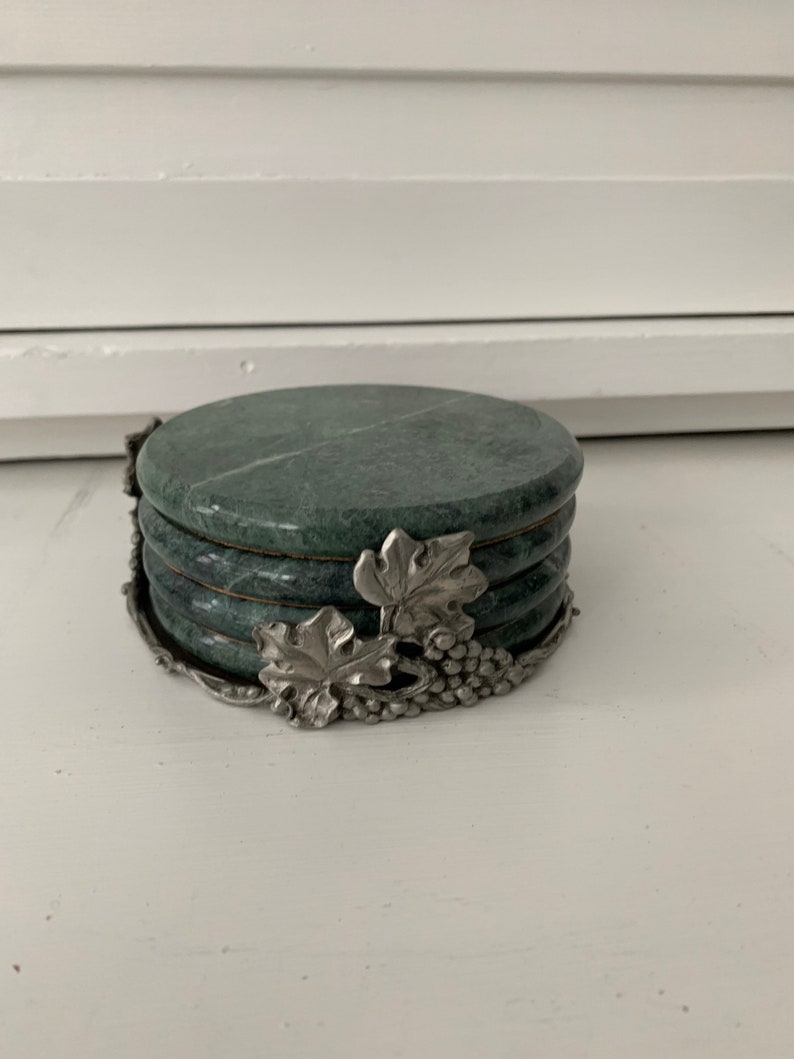 Vintage Seagull Pewter and marble grape pattern coaster set.