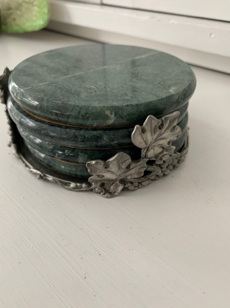 Vintage Seagull Pewter and marble grape pattern coaster set.